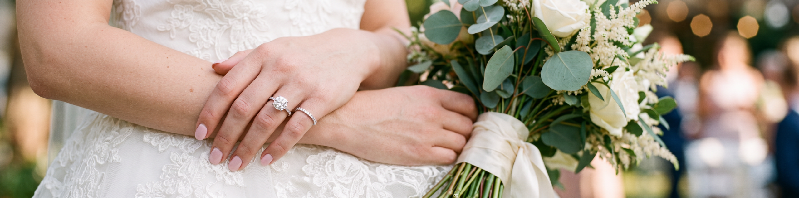 Hands forming a heart shape with a ring